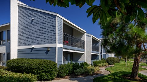 Outdoor photography with walkways at Crystal Springs apartments in Fountain Valley.
