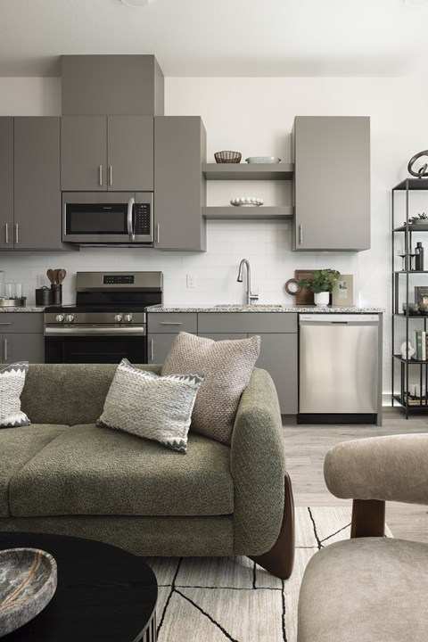 Alternate kitchen view that shows the modern features at Lofts on Monaco Apartments in Denver.