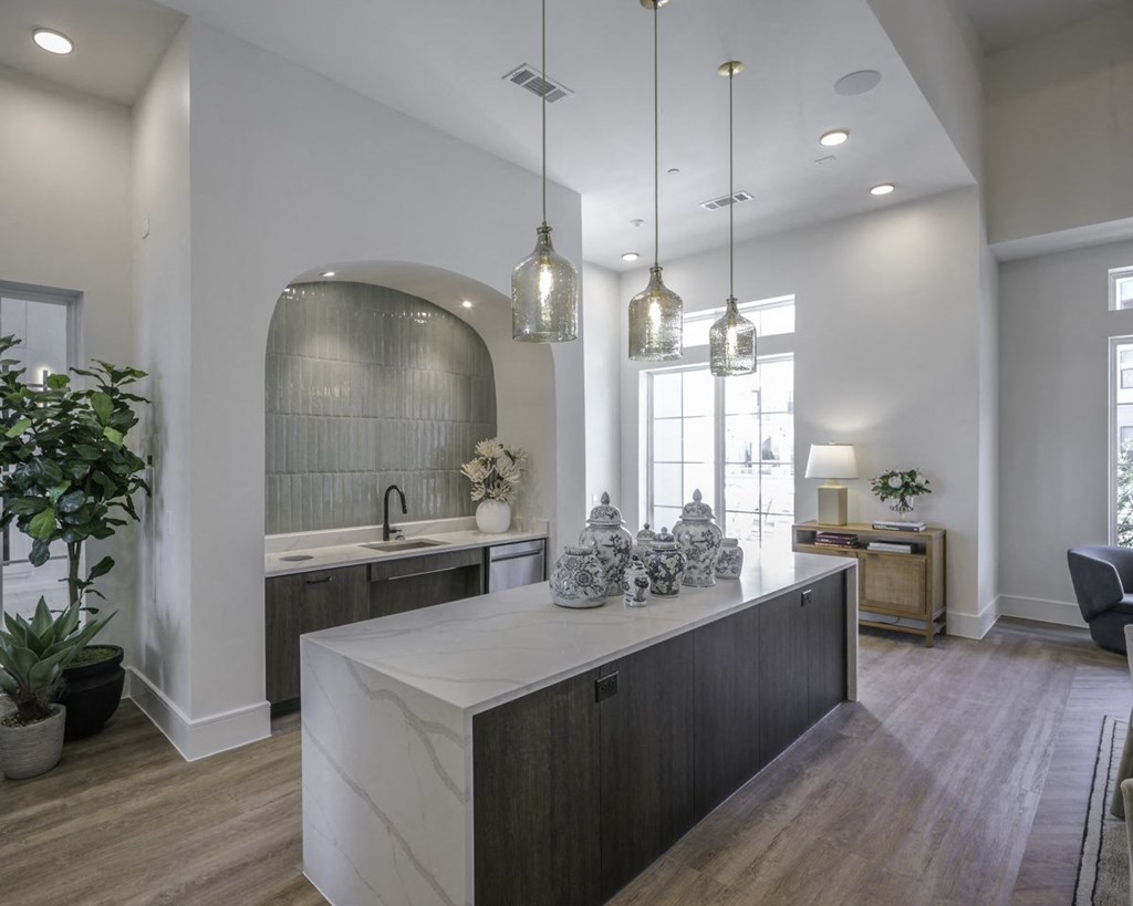 a kitchen with a large island in the middle