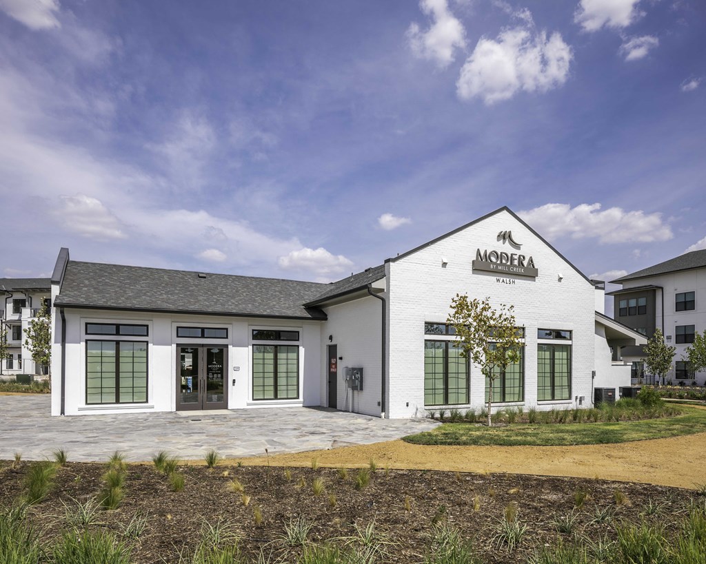 Full exterior of large clubhouse at Modera Walsh