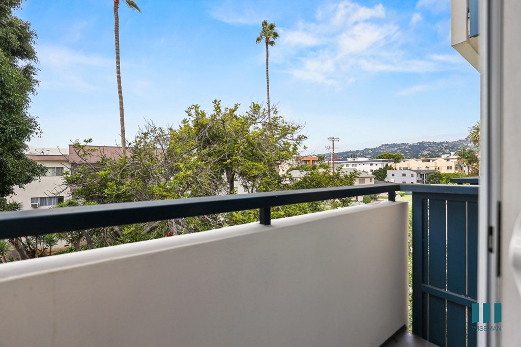 Upper-Level Patio with Skyline Views