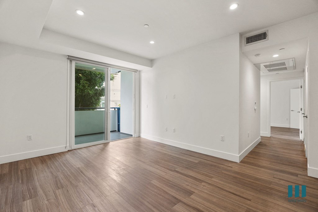 Living Room Vinyl Flooring, Recessed Lighting, and Patio