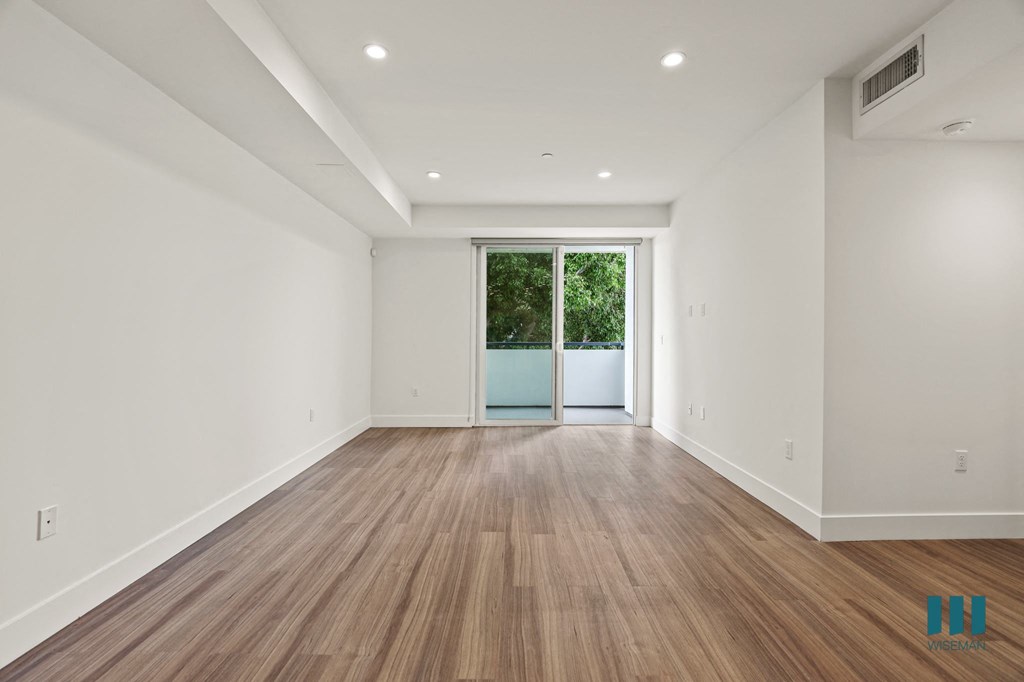 Living Room Recessed Lighting, Vinyl Flooring, and Patio