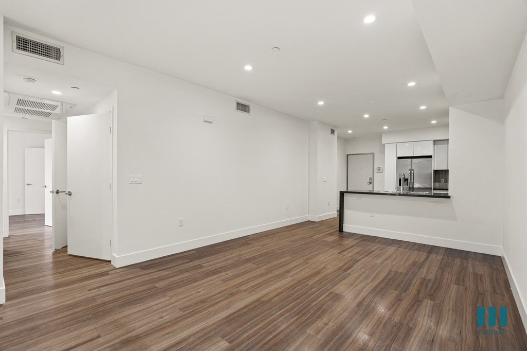 Front Entrance of Unit, Kitchen and Dining Space