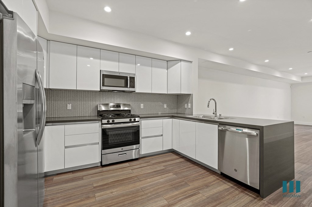 Large-Size Kitchen with Energy-Efficient Appliances and Ample Cabinet Storage