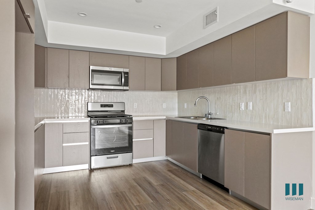 an illustration of a kitchen with a sink and a refrigerator