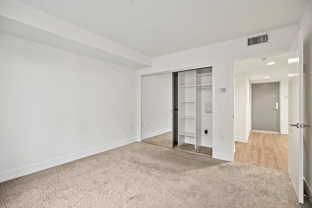 Bedroom with Closet with Shelving