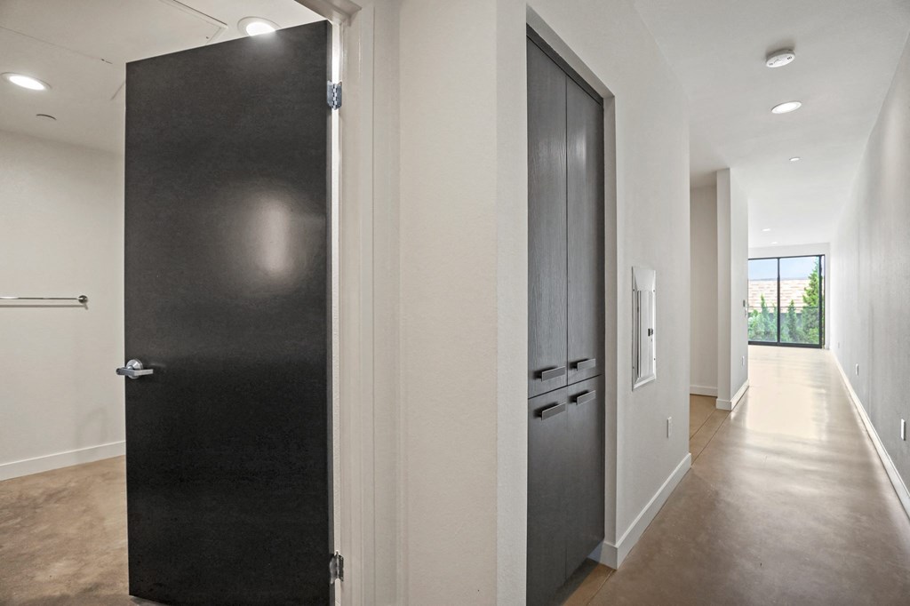 Open-Concept Floor Plan with Hall Storage Cabinets and Bathroom