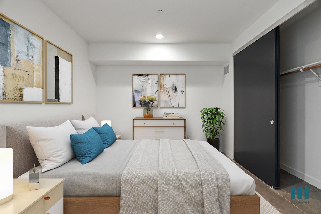 Bedroom with Recessed Lighting, Concrete Flooring, and Closet