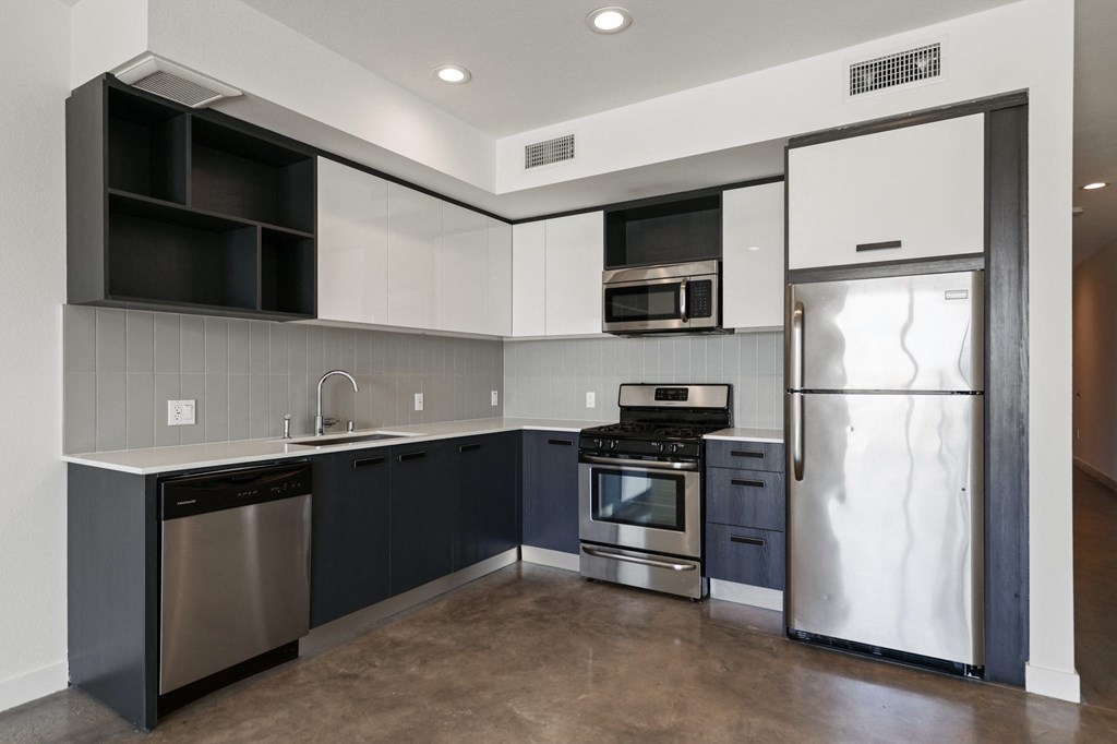 Kitchen with Stainless-Steel Refrigerator, Stove, and Dishwasher