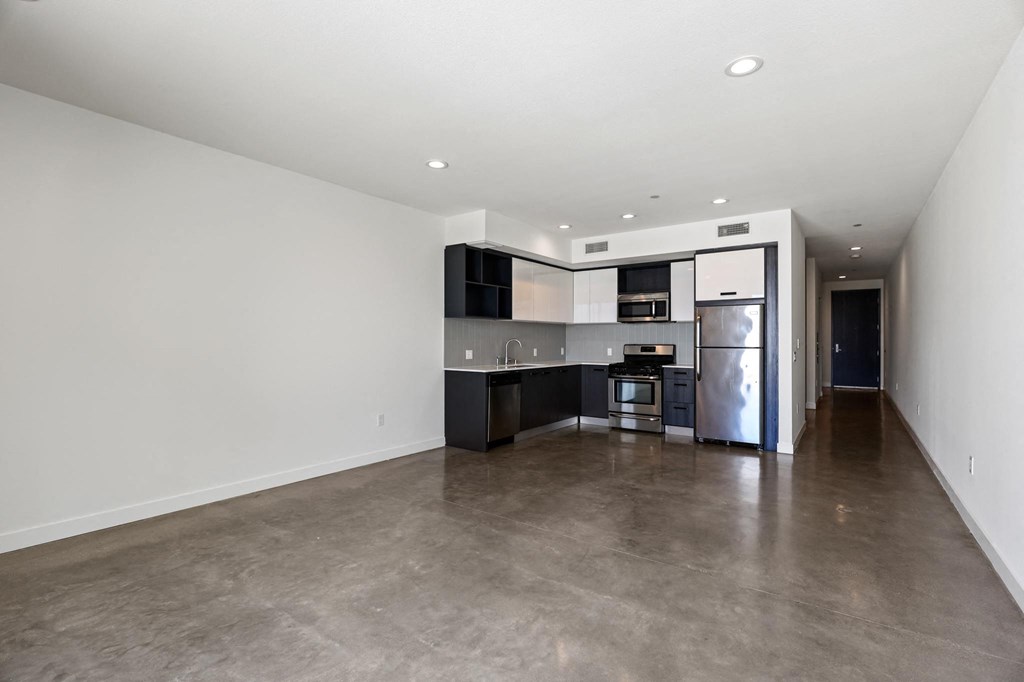 Open-Concept Kitchen, Dining, and Living Room Spaces