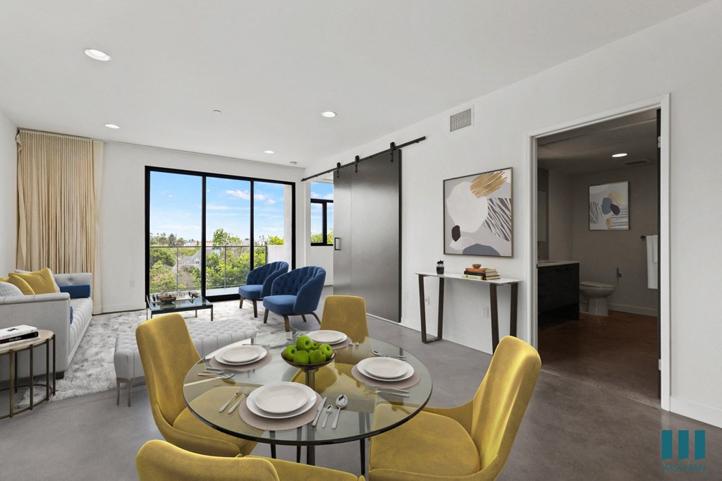 Open-Concept Kitchen, Dining, and Living Room Space with Bedroom and Bathroom