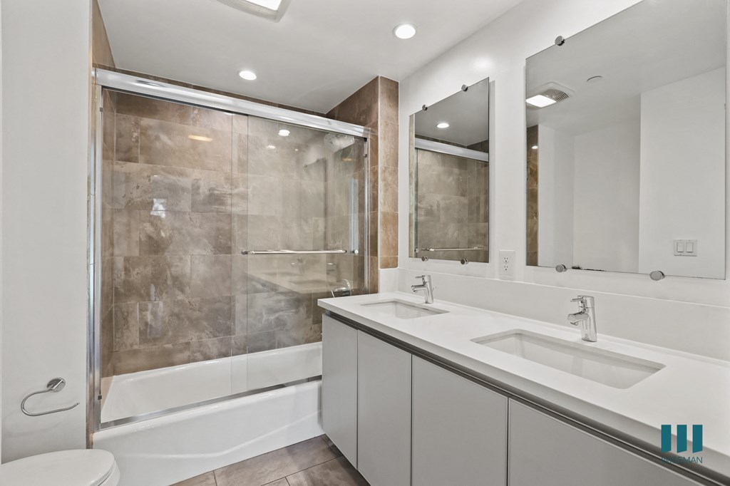 Bathroom with Shower Bath with Glass Door, Double-Sink Vanity with Cabinet Storage