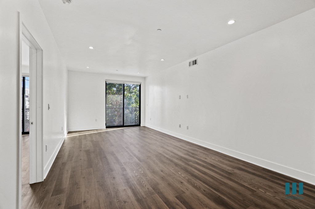 Living Room with Vinyl Flooring, Recessed Lighting, and Balcony