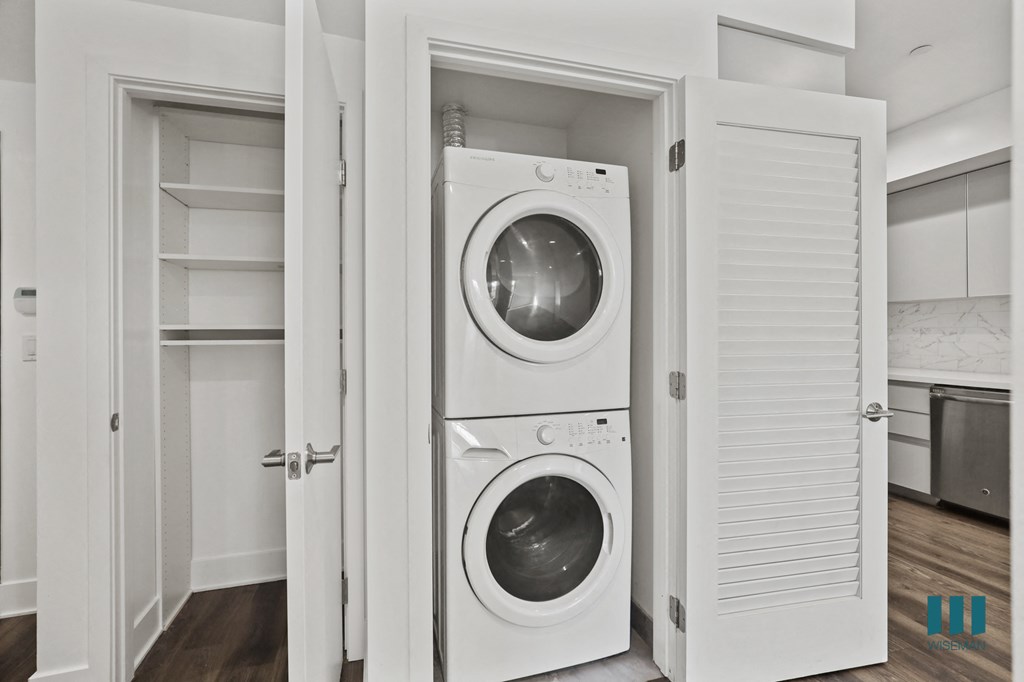 In-Suite Washer & Dryer and Hall Closet with Built-In Shelving