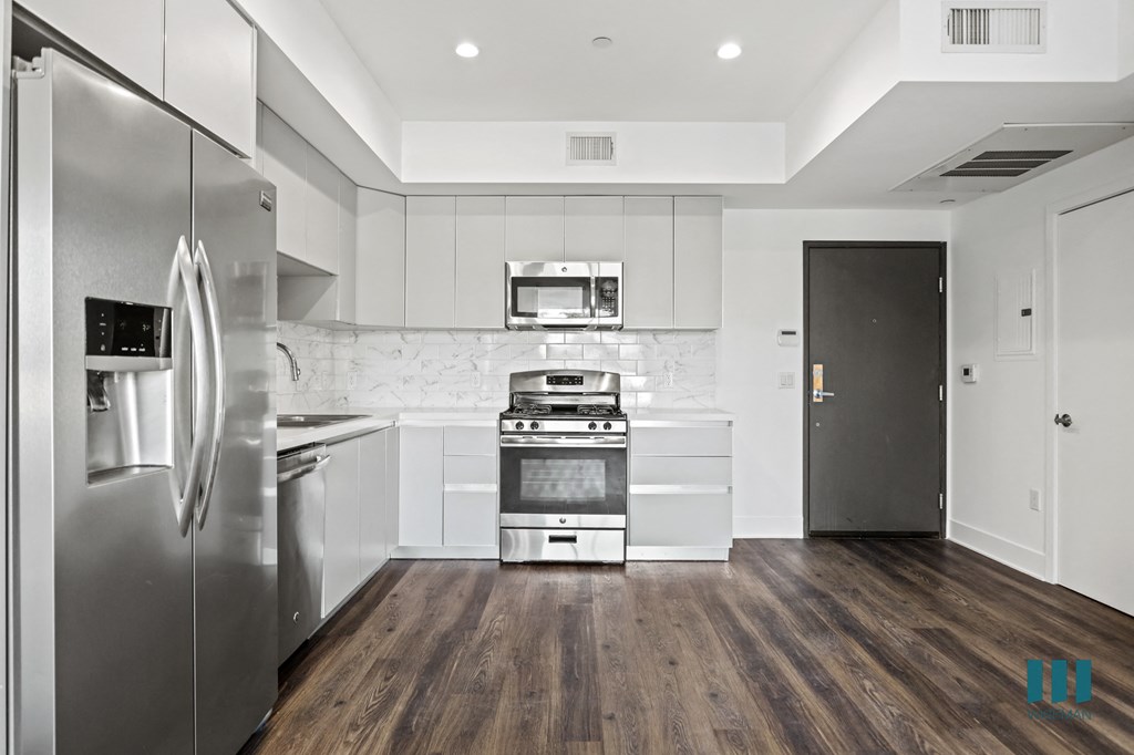 Front Entrance and Kitchen with Energy-Efficient Appliances