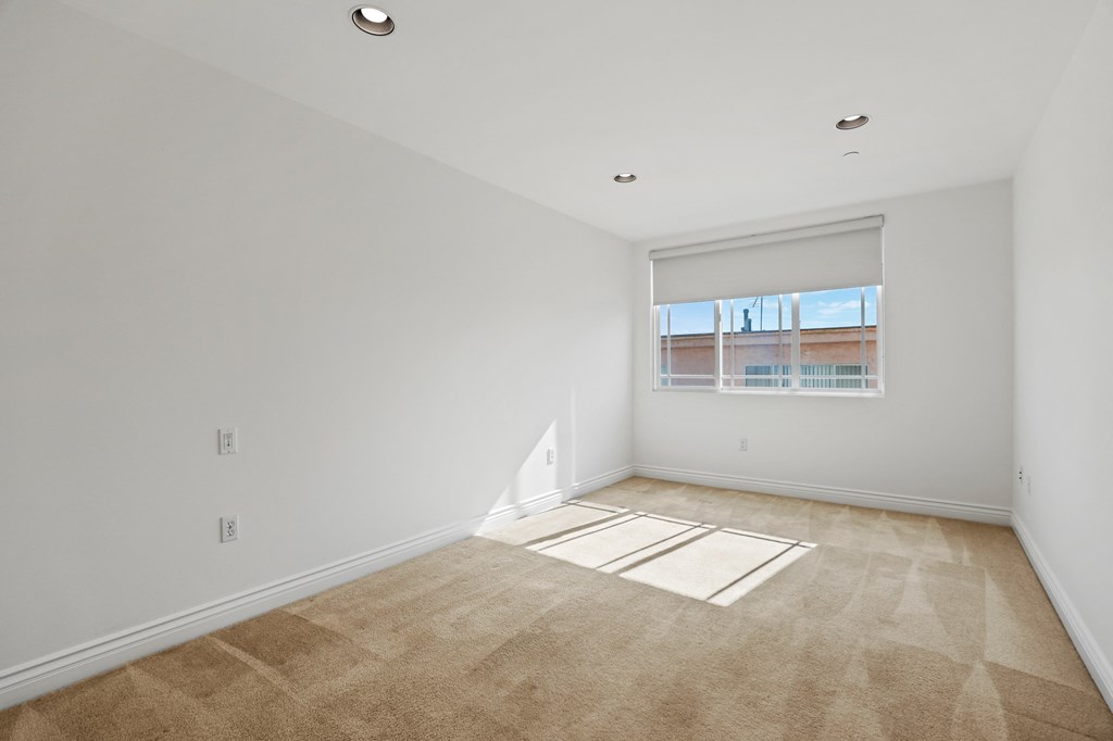 Bedroom with Recessed Lighting and Windows