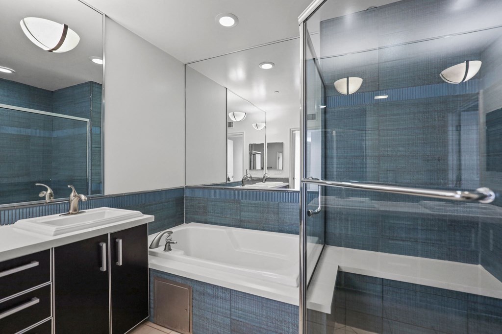 Bathroom with Bathtub and Stand-Up Shower