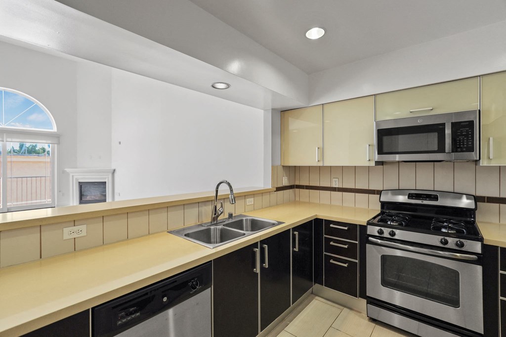 Kitchen with Stainless-Steel Stove, Microwave Oven, and Dishwasher