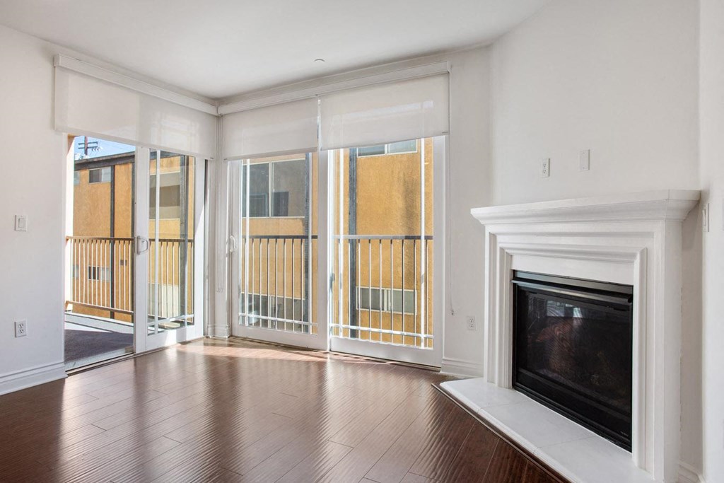 Living Room with Electric Fireplace, Patio with Window Shades