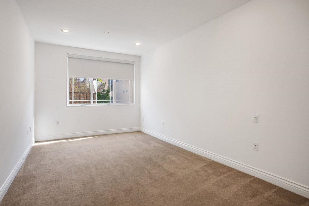 Bedroom with Recessed Lighting and Large-Size Windows