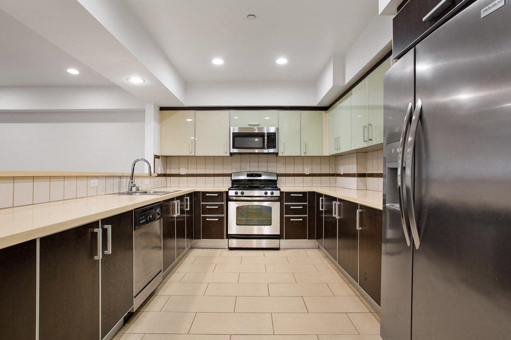 Large-Size Kitchen with Energy-Efficient Appliances with Ample Cabinet Storage