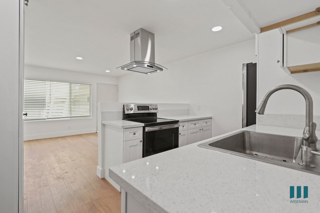 Open-Concept Kitchen, Dining, and Living Room Space