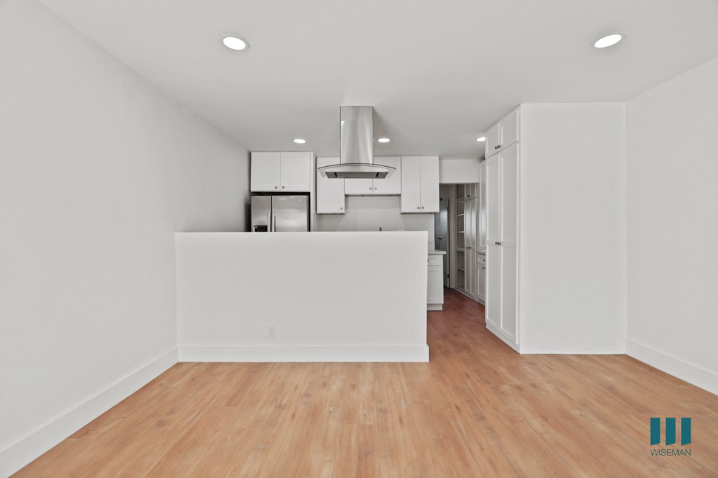 Open-Concept Kitchen, and Dining Room with Countertop Bar