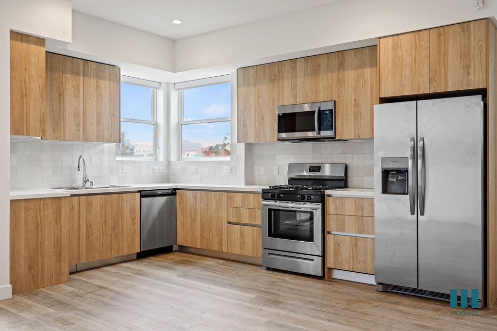 a rhythmic pattern of small blue spheres on a black background