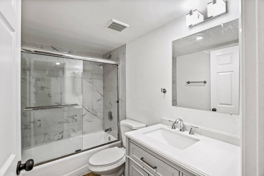 Bathroom with Bathtub with Glass Doors