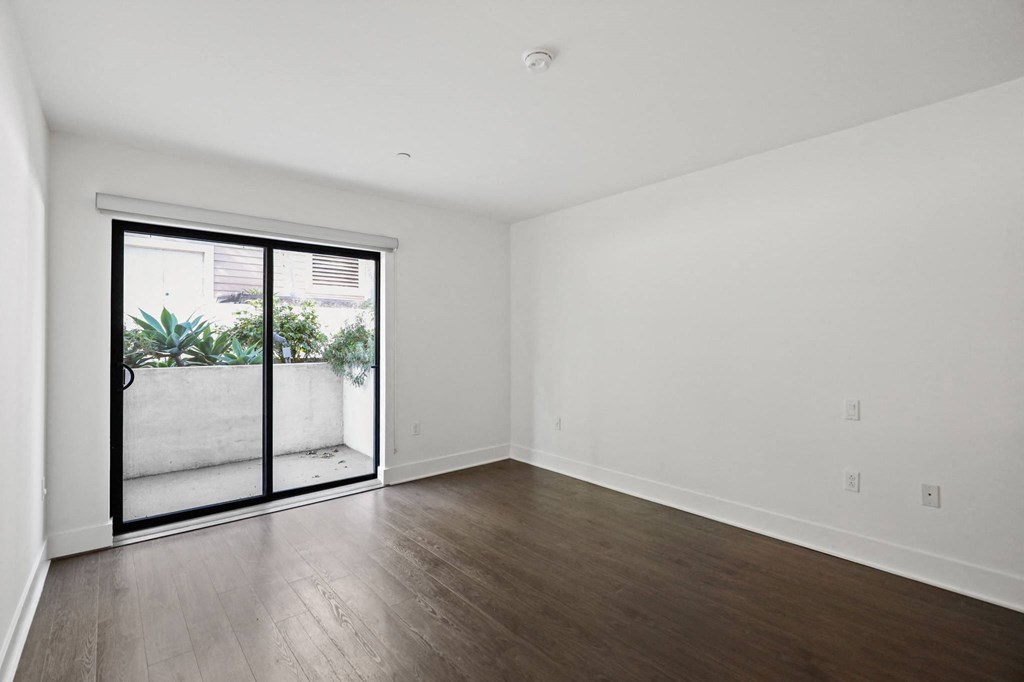 Living Room with Vinyl Flooring and Patio