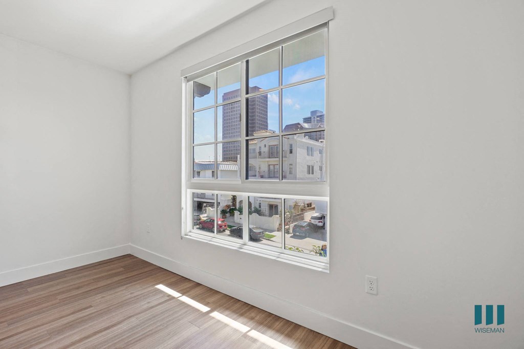 Bedroom with Windows and Vinyl Flooring