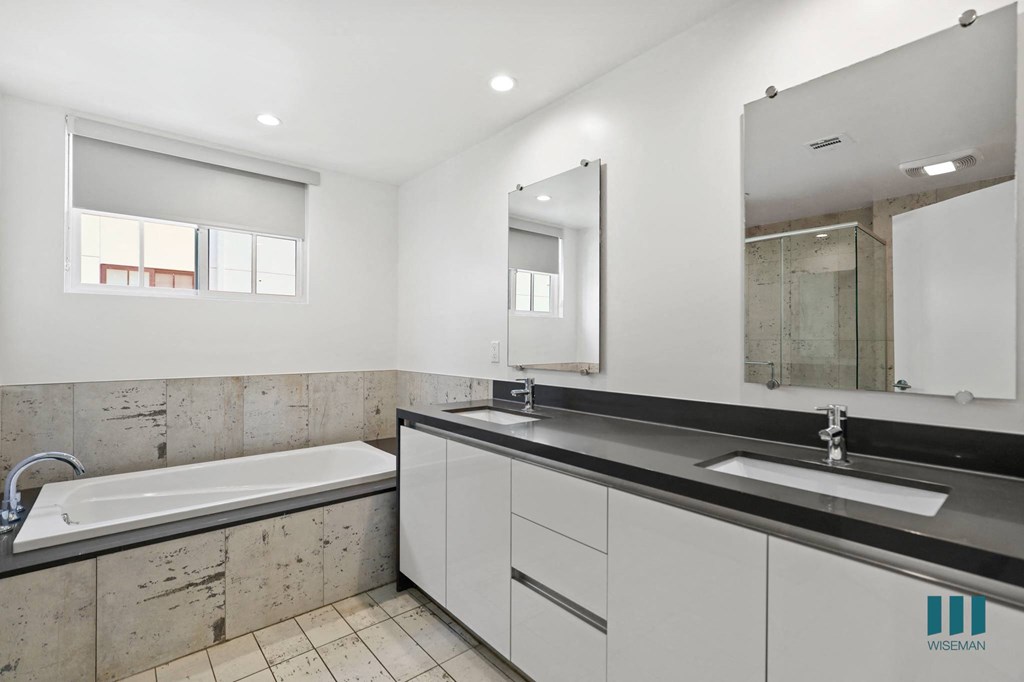 Large-Size Bathroom with Bathtub and Double-Sink Vanity