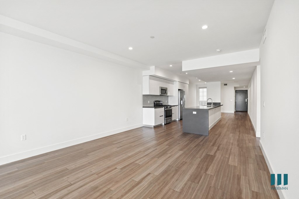 Open-Concept Kitchen, Dining, and Living Room Areas