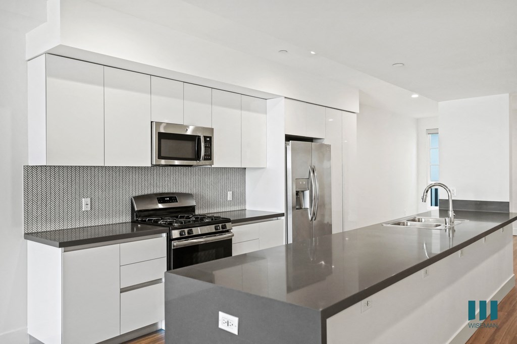 Open-Concept Kitchen with Countertop Bar