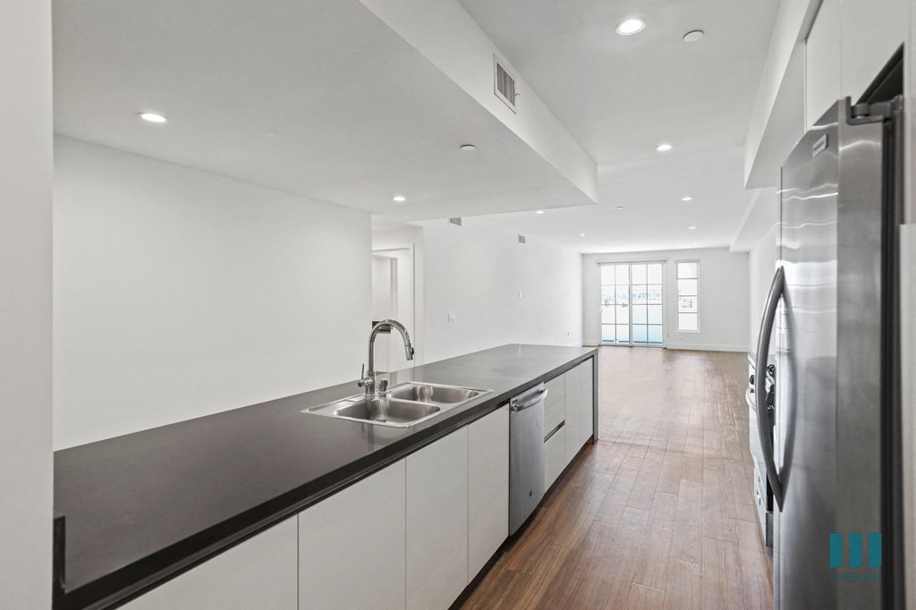 Kitchen with Large-Size Countertop Bar