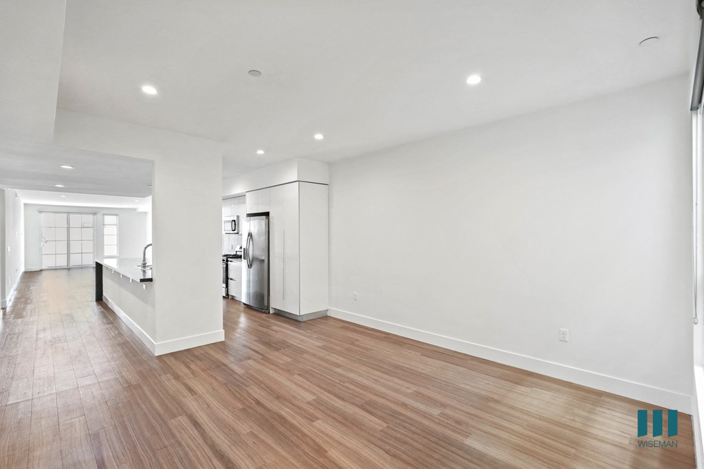 Open-Concept Kitchen, Dining, and Living Room Areas