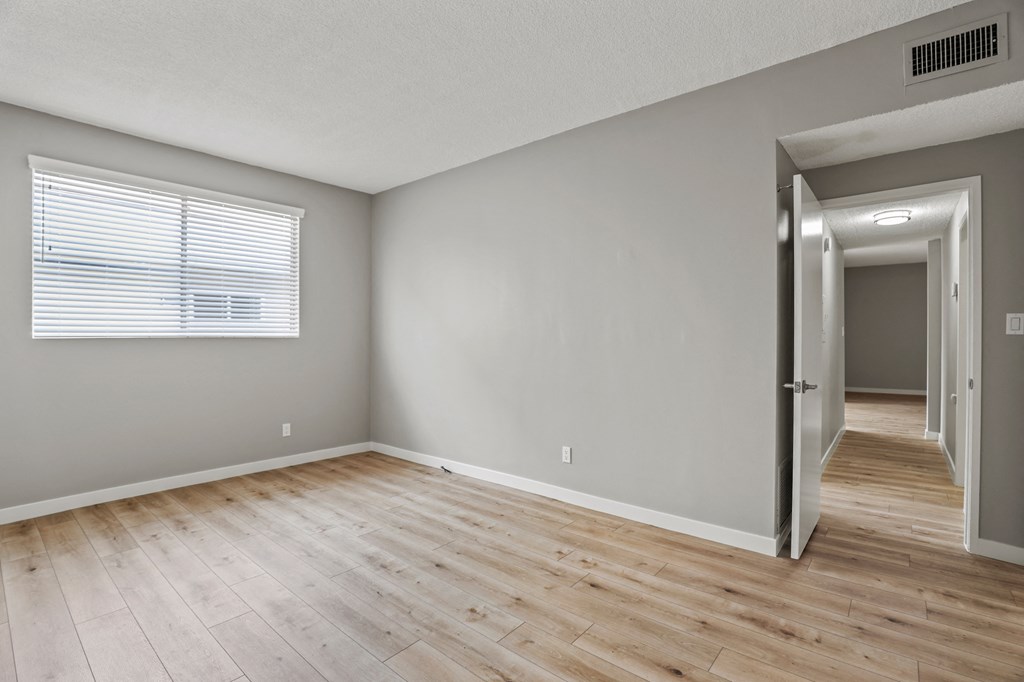 Bedroom with Window and Vinyl Flooring