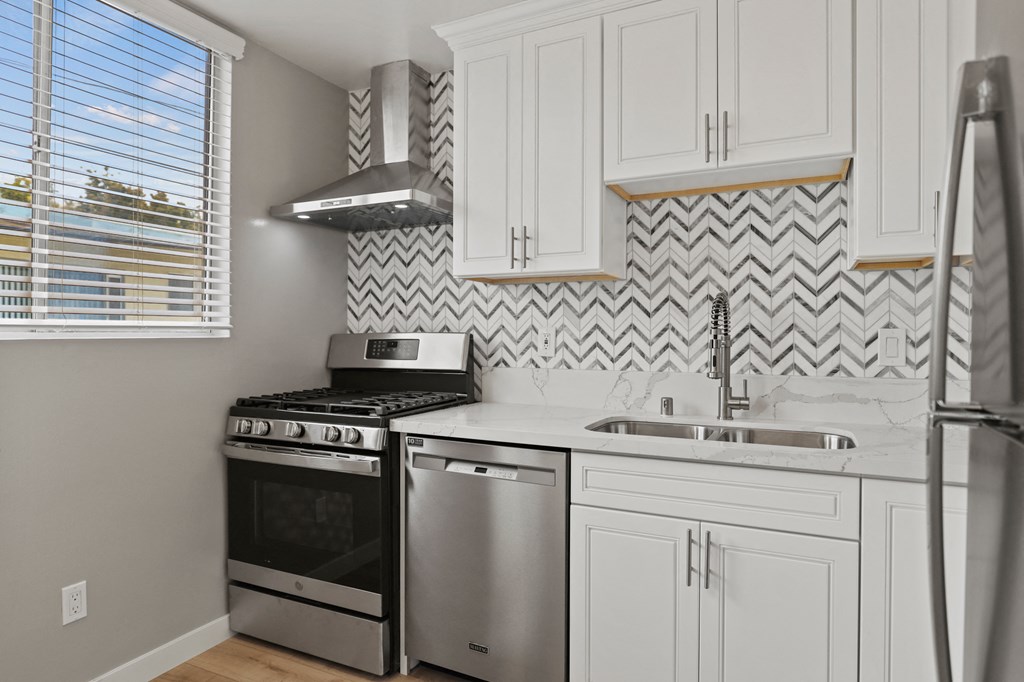 Kitchen with Stainless-Steel Refrigerator, Stove, and Dishwasher