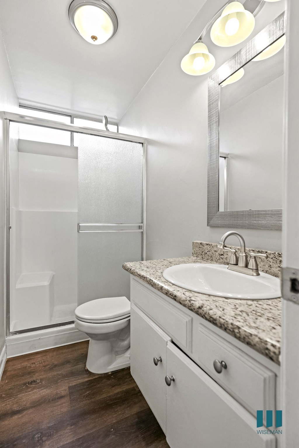 Bathroom with Walk-In Shower and Vanity Cabinet Storage