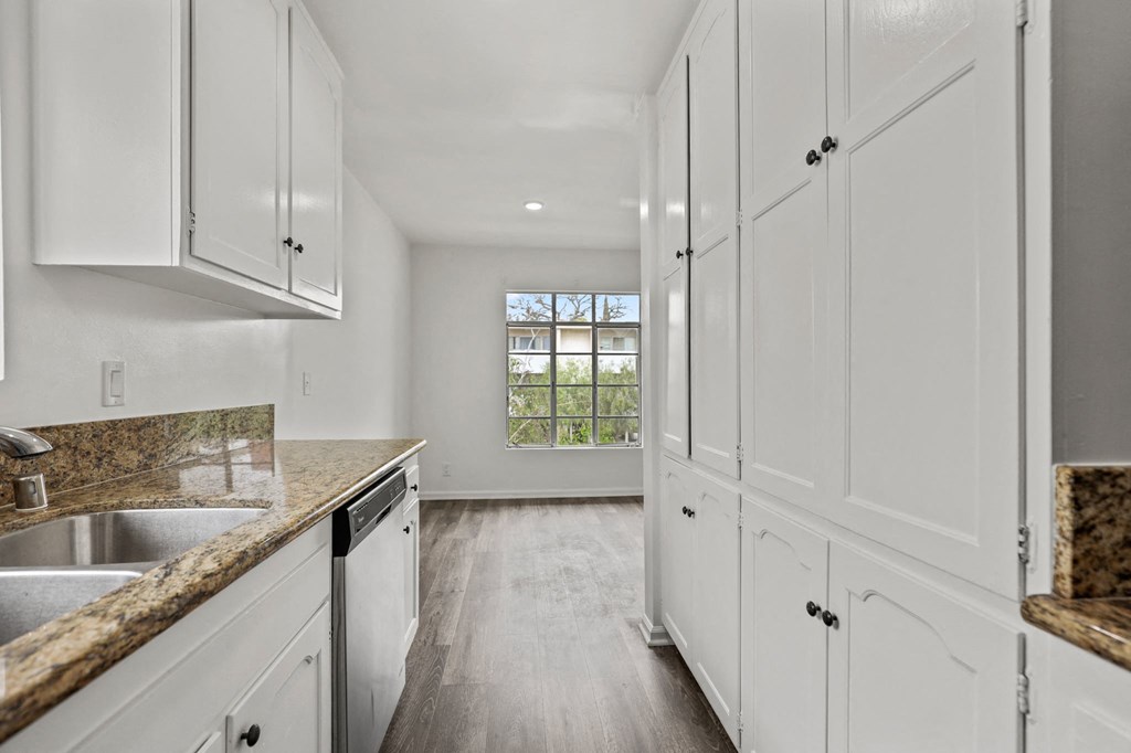 Kitchen with Ample Cabinet and Pantry Storage