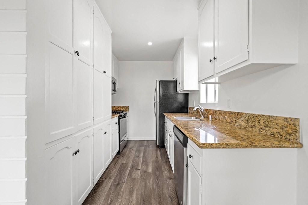 Full-Size Kitchen with Energy-Efficient Appliances and Ample Cabinet Storage