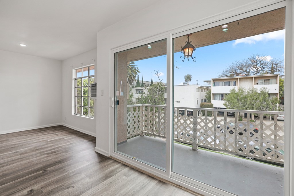 Living Room with Patio and Windows Providing Lots of Natural Light