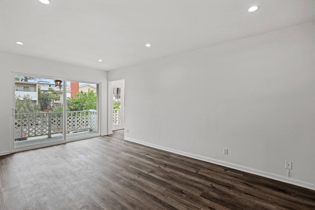 Living Room with Recessed Lighting, Vinyl Flooring, and Balcony