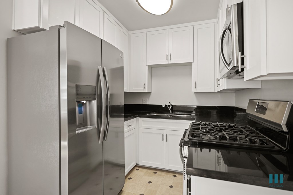 Kitchen with Energy-Efficient Appliances and Cabinet Storage