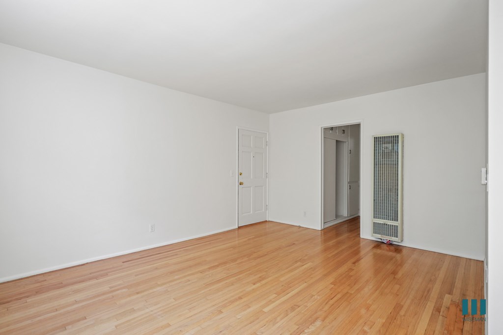 Front Entry and Living Room with Vinyl Flooring