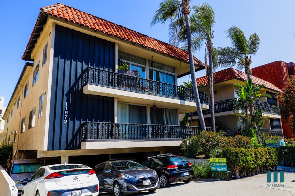 a large building with a red tile roof