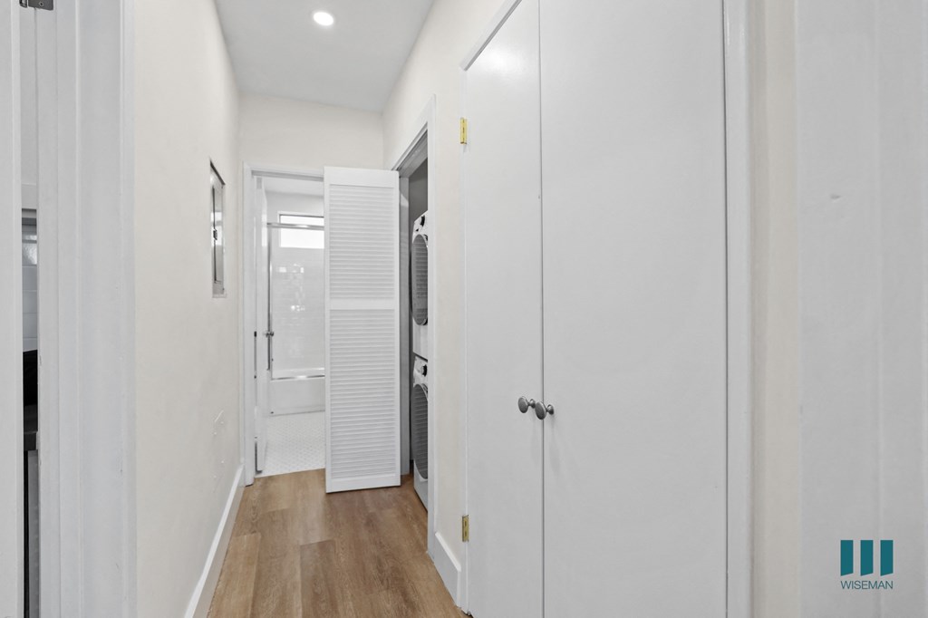 Hallway with In-Suite Washer & Dryer