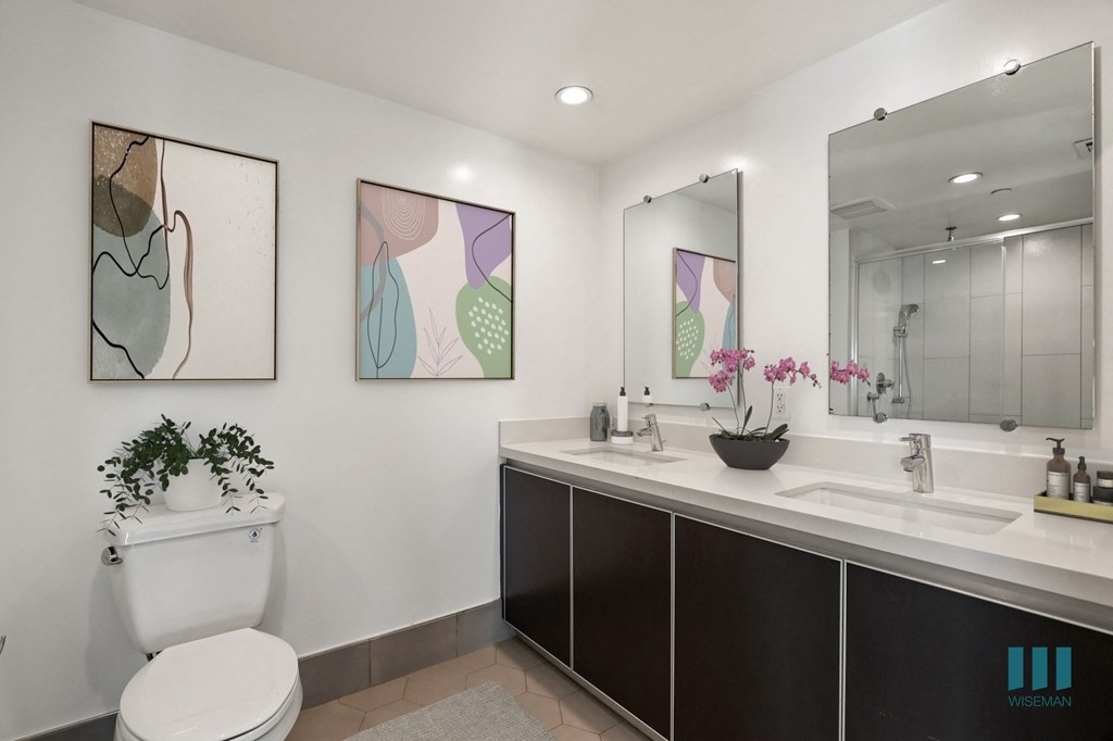 Bathroom with Double-Sink Vanity and Cabinet Storage