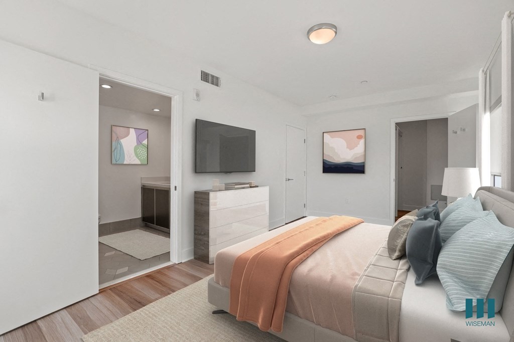 Bedroom with Bathroom and Walk-In Closet